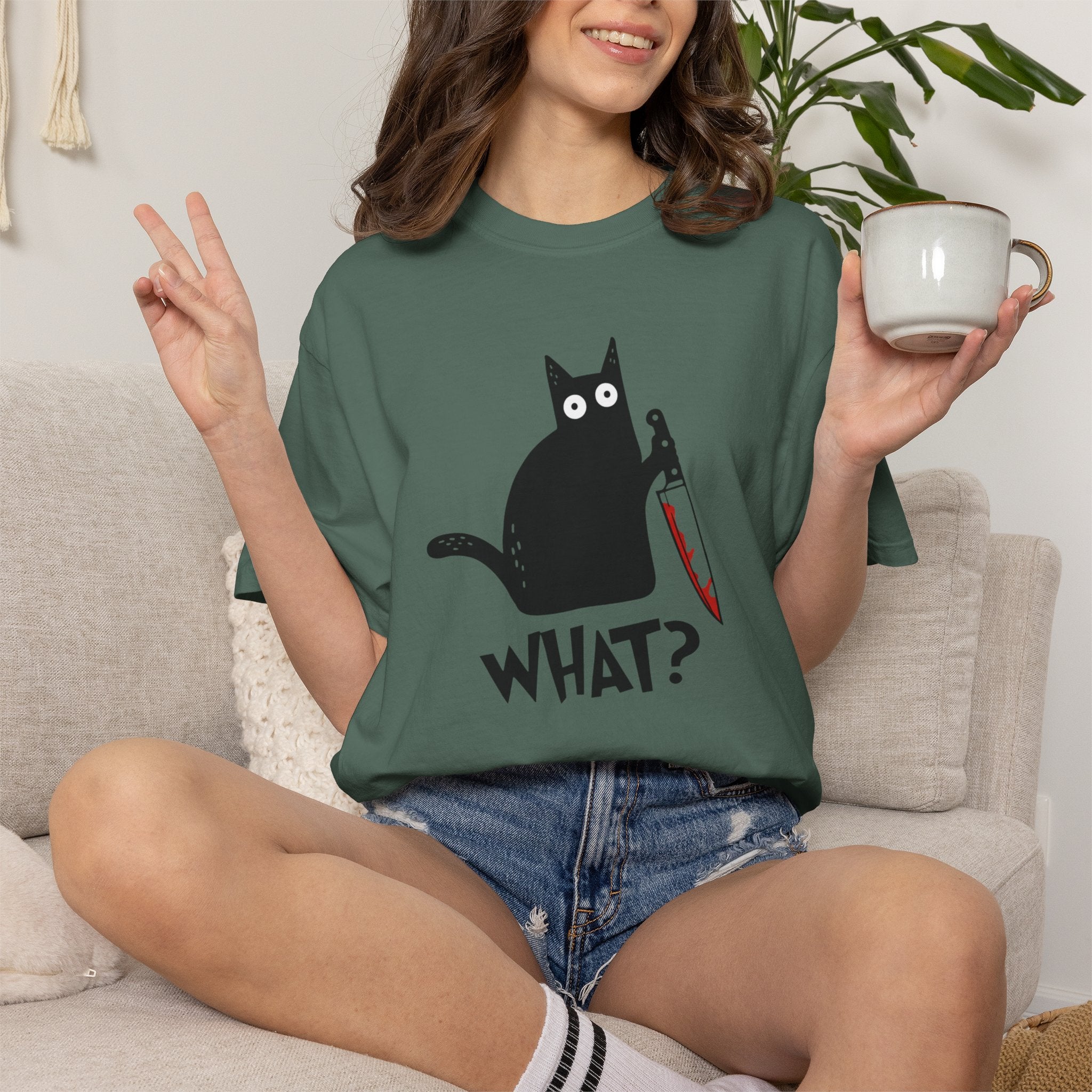 Funny Cat Holding Knife T-Shirt — "What?" Graphic Tee (Dark Humor, Halloween Gift)